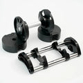 Pair of adjustable dumbbells on a white background
