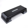 Black step platform with a brand label on a white background