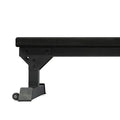 Black metal flat bench on a white background