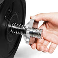 Hand using a metal tool on a wheel, likely for maintenance or repair.