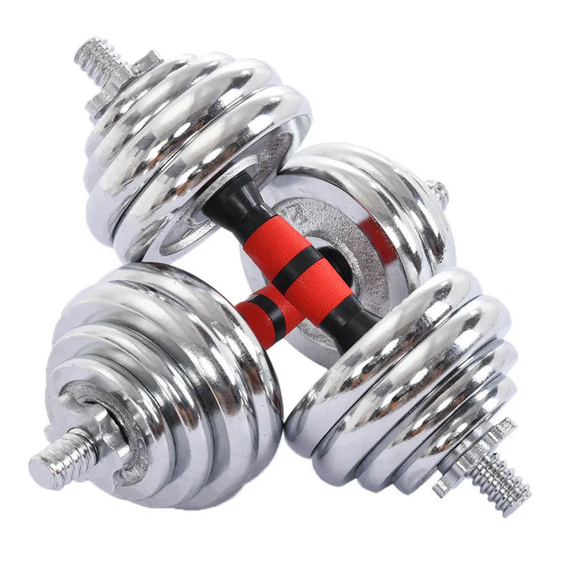 Set of silver dumbbells with red accents on a white background