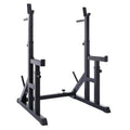 Black metal squat rack on a white background
