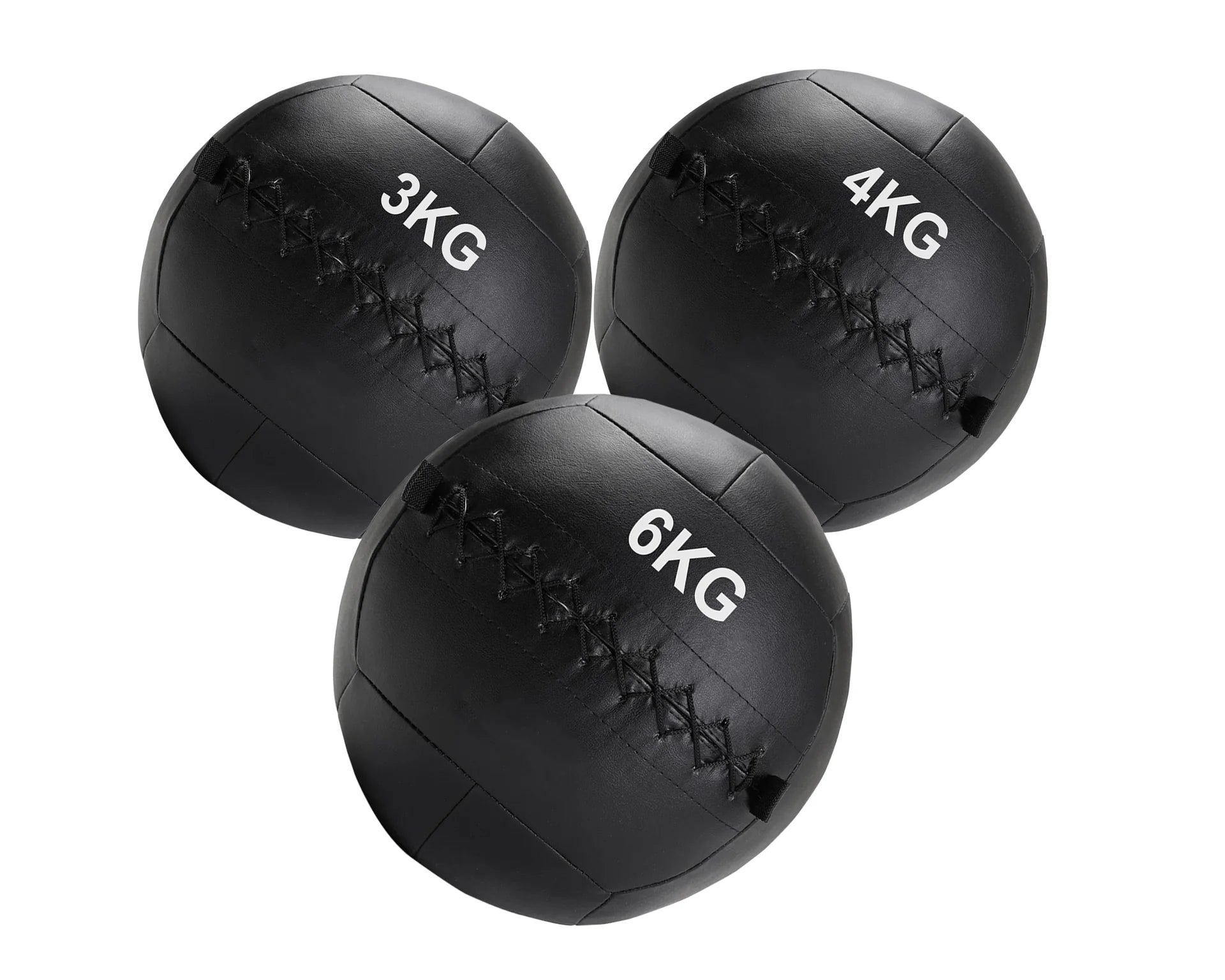 Three black weighted medicine balls with weight markings on a white background